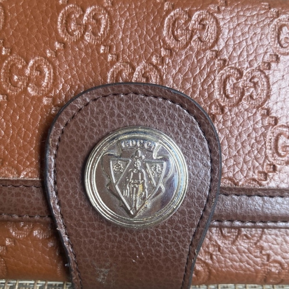 Brown Embossed Wallet with Silver Accent
Fashion - Picture 2 of 4